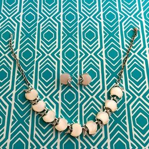 White vintage, necklace and clip on earrings.